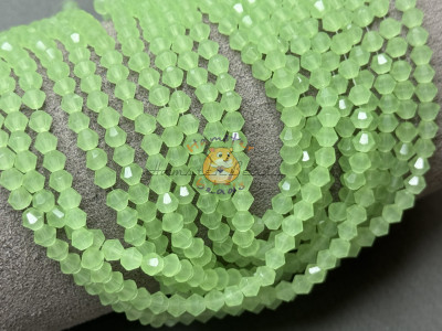 Биконусы стеклянные Light Green Opal #148 4 мм/ 1 нить