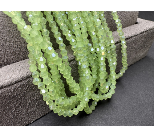 Биконусы стеклянные Light Green Opal Luster #38L 3 мм/ 1 нить