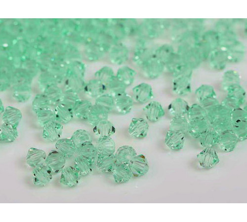 Биконусы Preciosa Chrysolite 4 mm