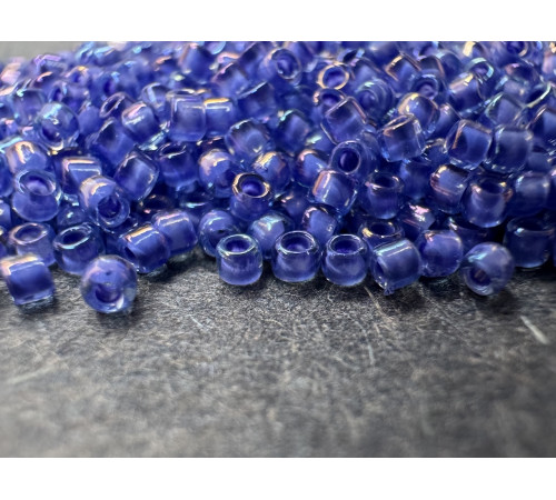 Бисер TOHO Round 15/0 TR-15-934 - Inside-Color Lt. Sapphire/Opaque Purple-Lined